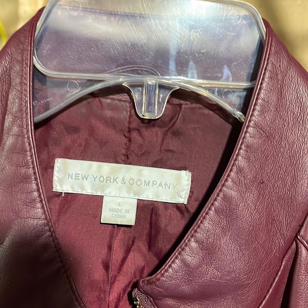 Size L like new. Plum colored women’s Faux Leather jacket.